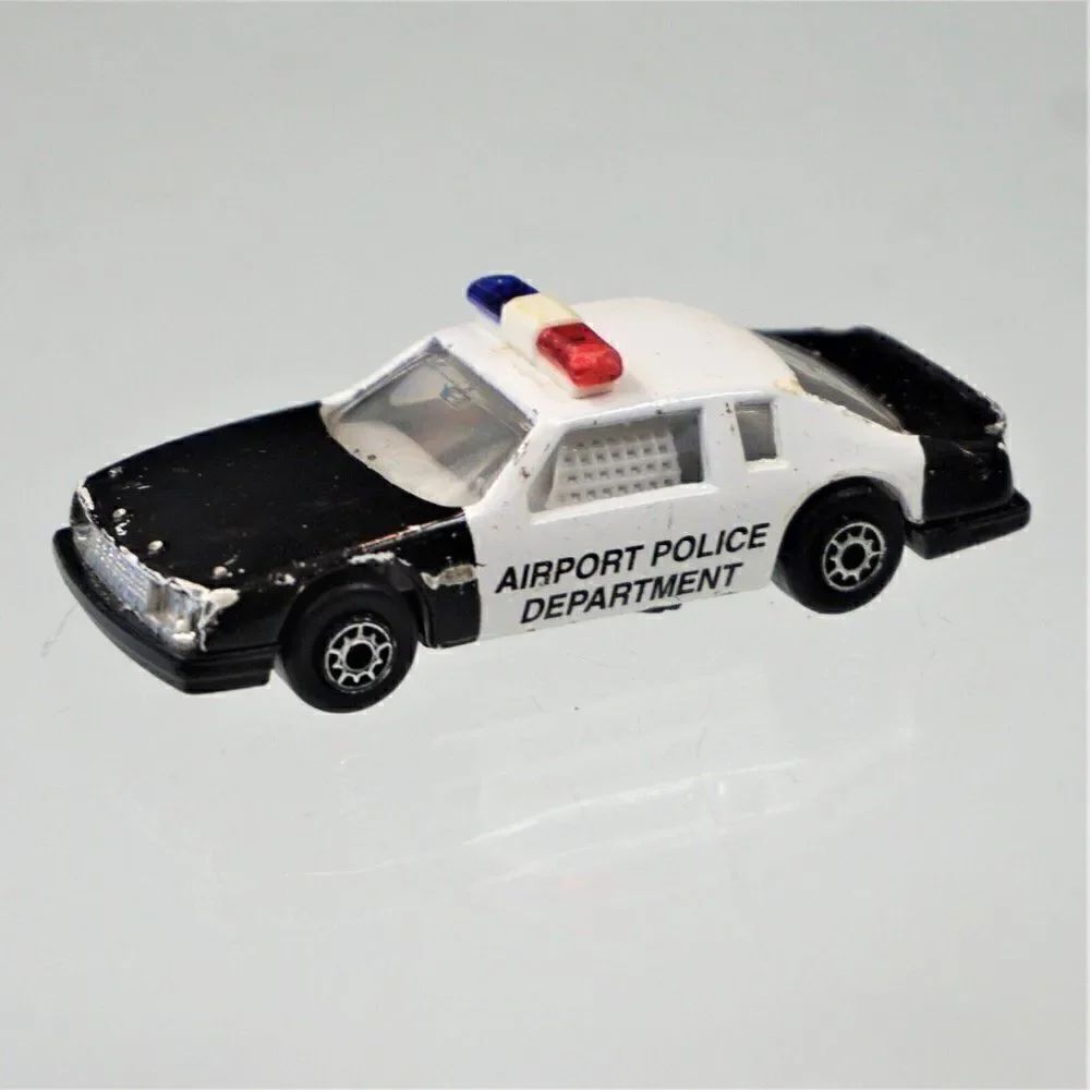Maisto Buick LeSabre Airport Police Car Diecast Toy 1/64 Scale Black White